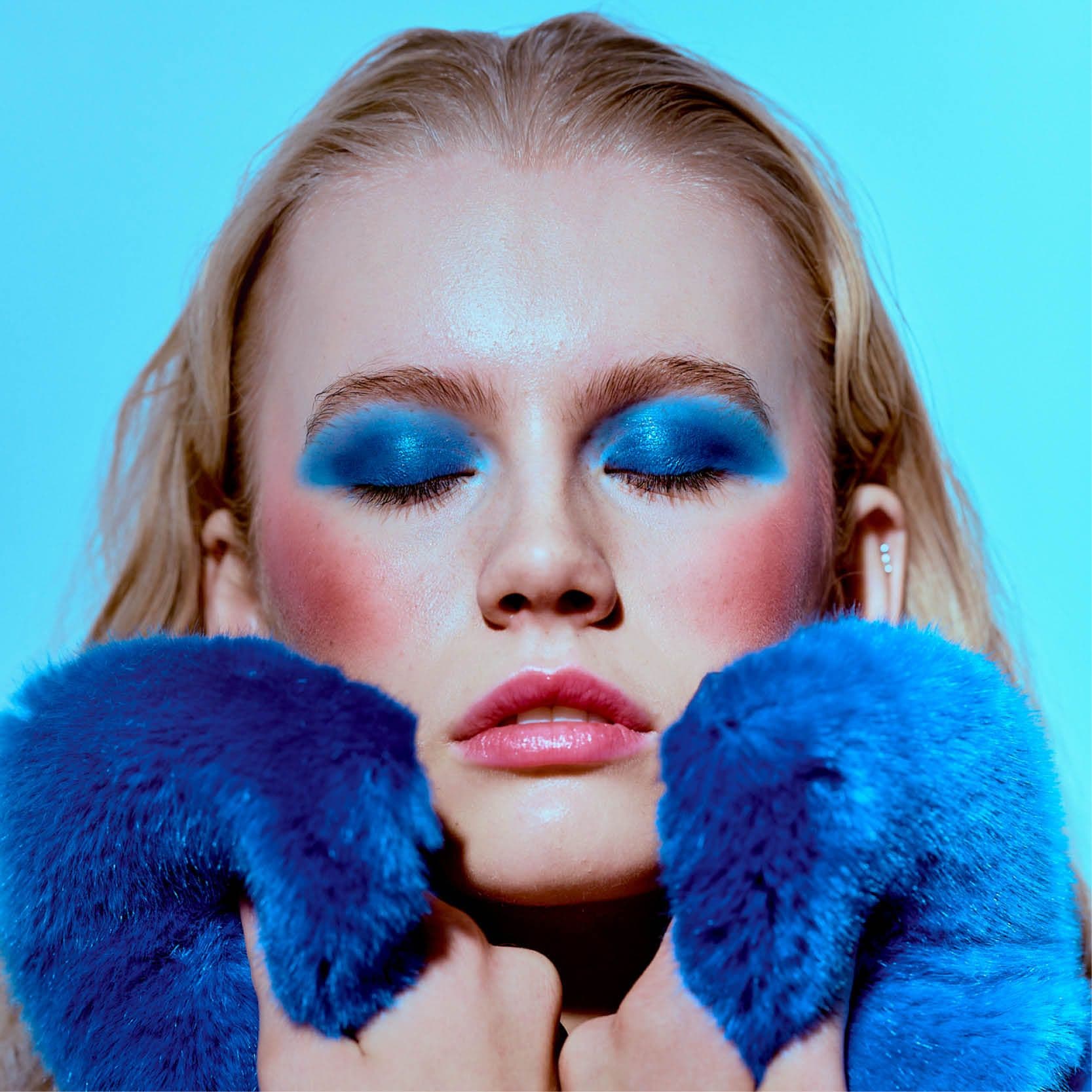 Woman in blue coat